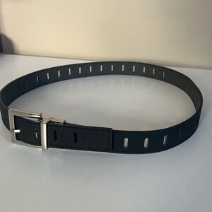 Black leather Adrienne Vittadini belt with silver buckle, size S/M